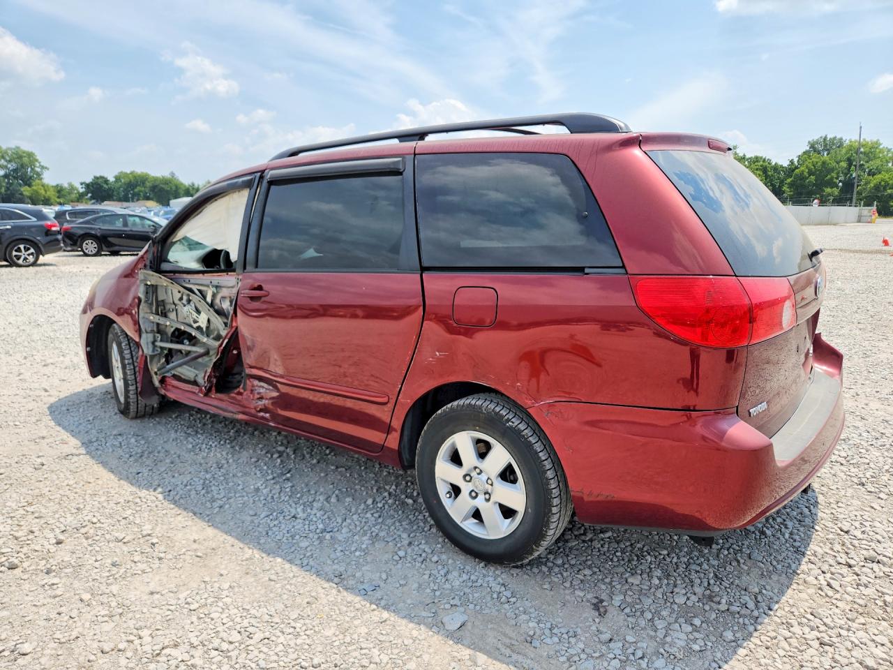 2009 Toyota Sienna Le 7-passenger Бордовый vin: 5TDZK23C79S247562