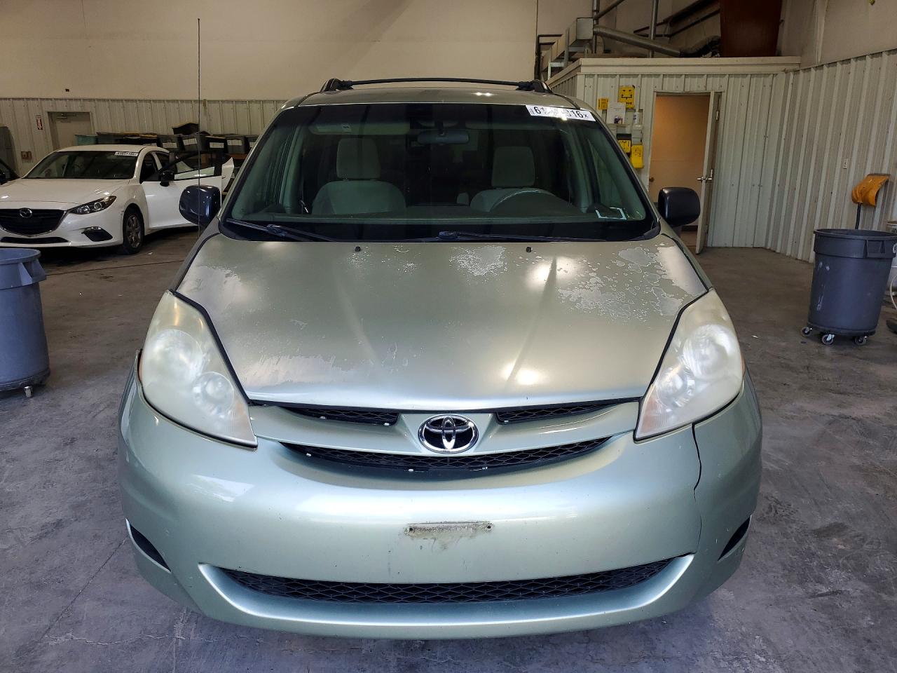 2009 Toyota Sienna Le 7-passenger Green vin: 5TDZK23C89S268047