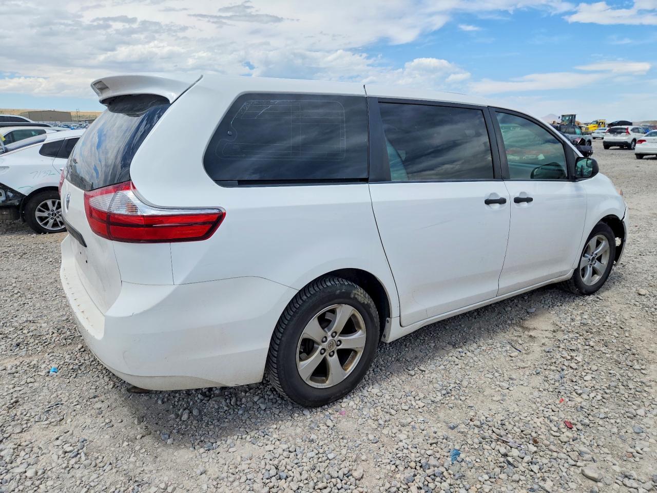 2015 Toyota Sienna L 7-passenger White vin: 5TDZK3DC1FS603746
