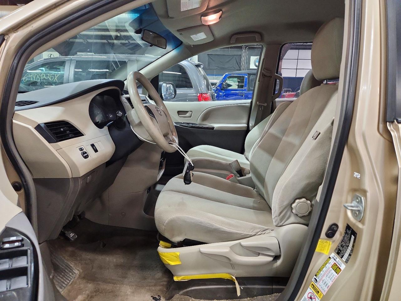 2012 Toyota Sienna Base 7-passenger Beige vin: 5TDZK3DC2CS182597