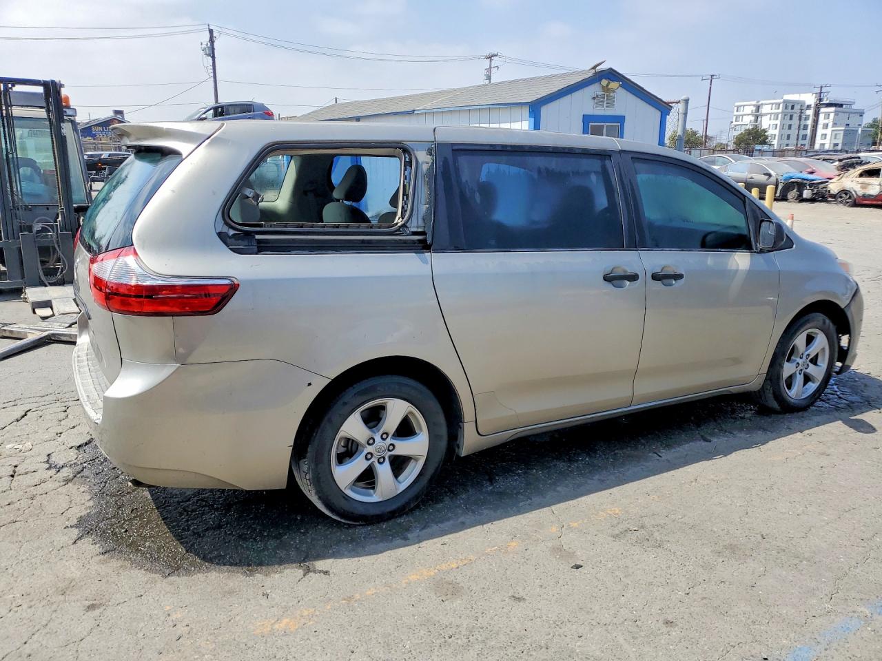 2015 Toyota Sienna L 7-passenger Beige vin: 5TDZK3DC2FS564441