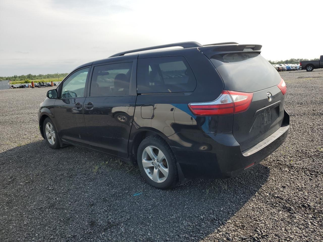 2015 Toyota Sienna L 7-passenger Black vin: 5TDZK3DC3FS629426 Damage: Left Rear Door, Dent(S) W/ Paint Dmg, 9 To 10 Inches