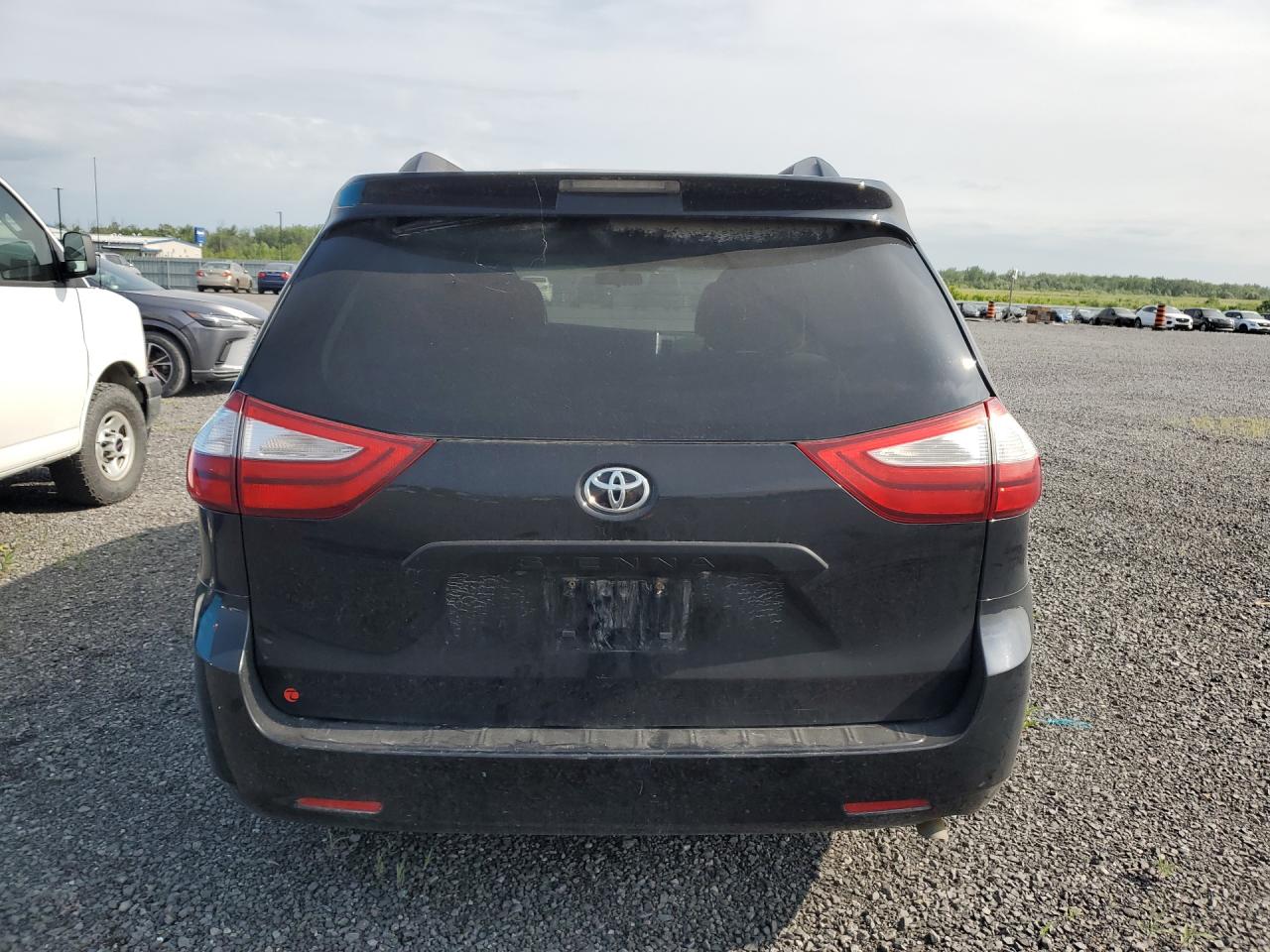 2015 Toyota Sienna L 7-passenger Black vin: 5TDZK3DC3FS629426 Damage: Rear Bumper, Chipped, 4
