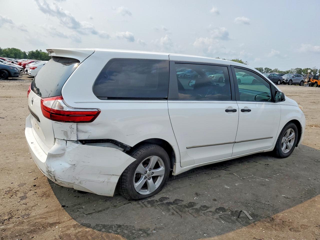 2015 Toyota Sienna L 7-passenger White vin: 5TDZK3DC8FS546459