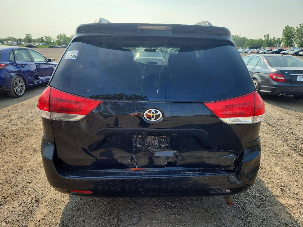 2011 Toyota Sienna Base 7-passenger Black vin: 5TDZK3DC9BS050290