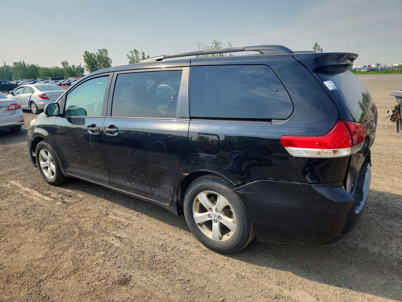 2011 Toyota Sienna Base 7-passenger Black vin: 5TDZK3DC9BS050290