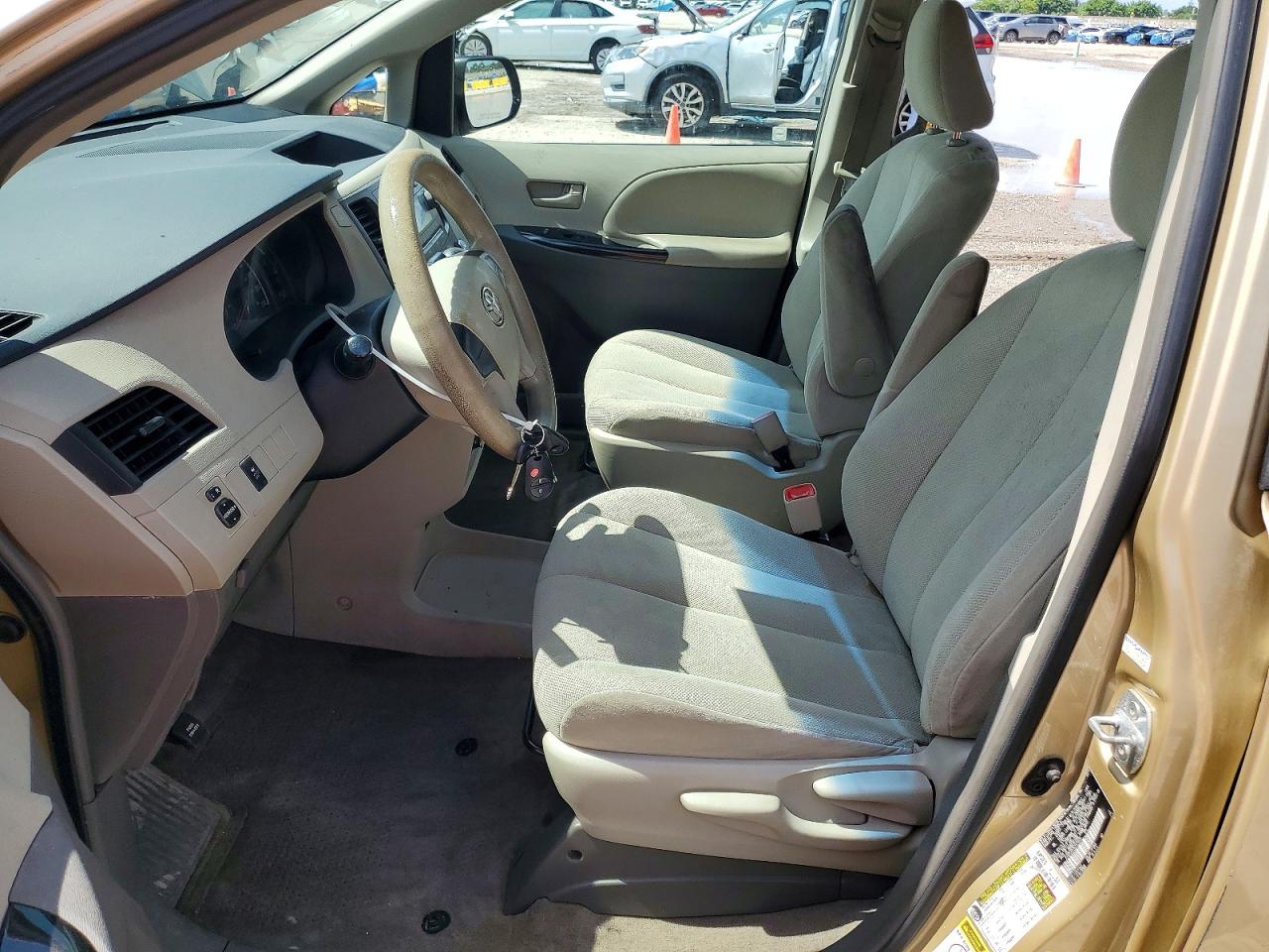 2014 Toyota Sienna L 7-passenger Gold vin: 5TDZK3DCXES470225