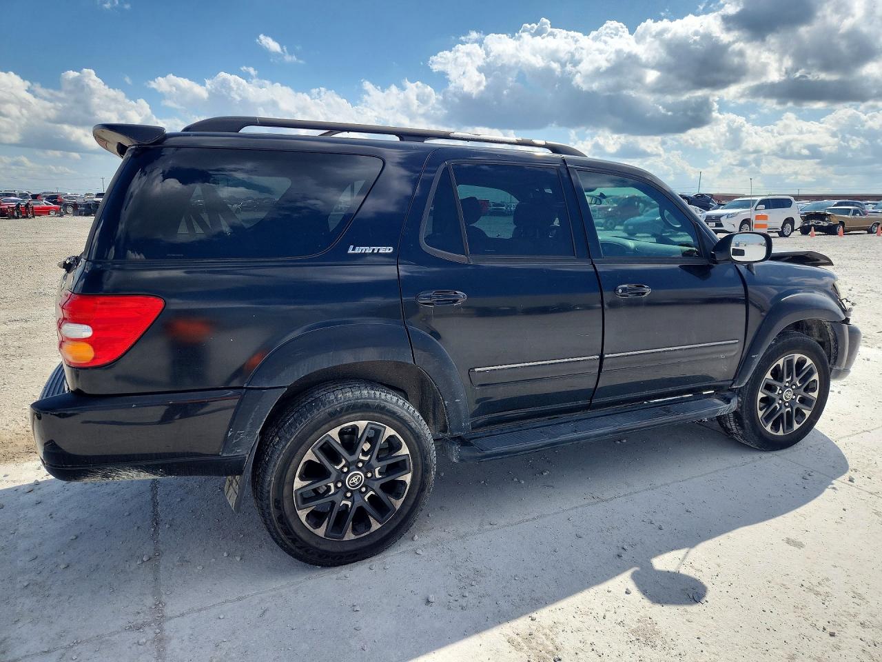 2001 Toyota Sequoia Limited Черный vin: 5TDZT38A11S043192