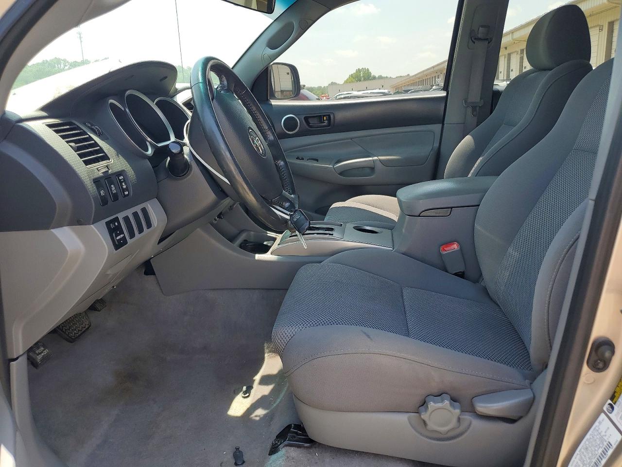 2005 Toyota Tacoma Double Cab Золотой vin: 5TELU42N45Z047217