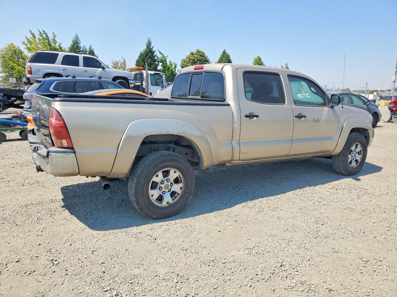 2005 Toyota Tacoma Double Cab Long Bed Gold vin: 5TEMU52N05Z008019