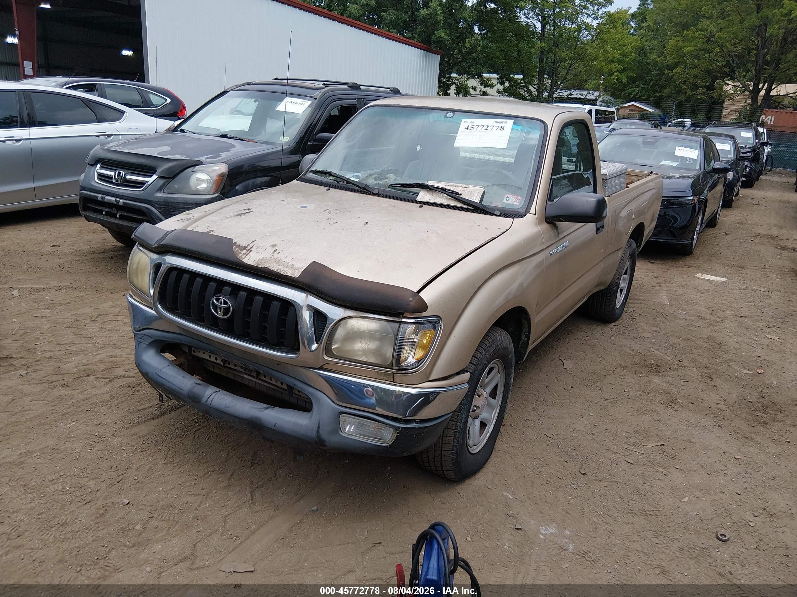 2001 Toyota Tacoma   Gold vin: 5TENL42N11Z728523