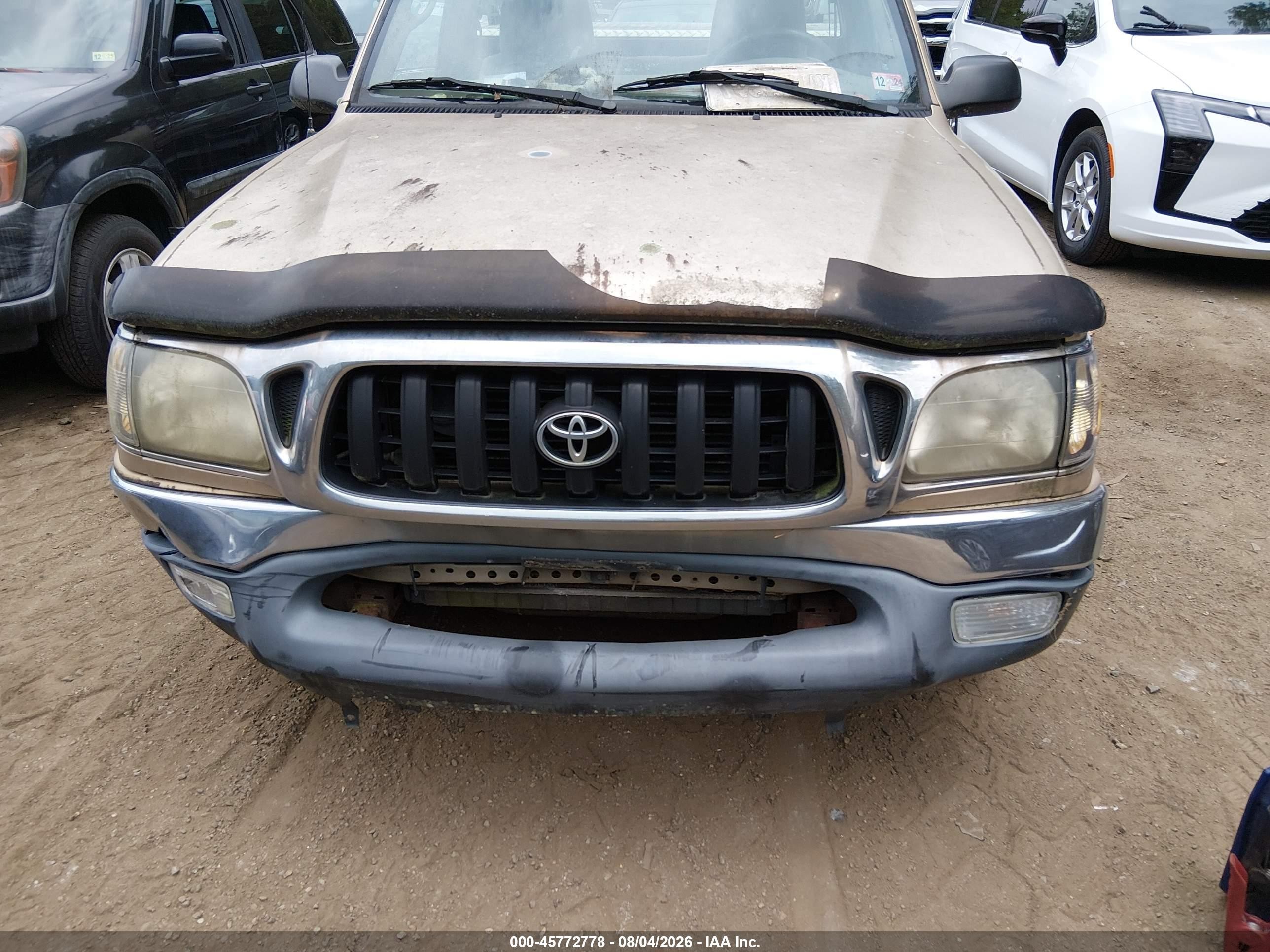 2001 Toyota Tacoma   Gold vin: 5TENL42N11Z728523