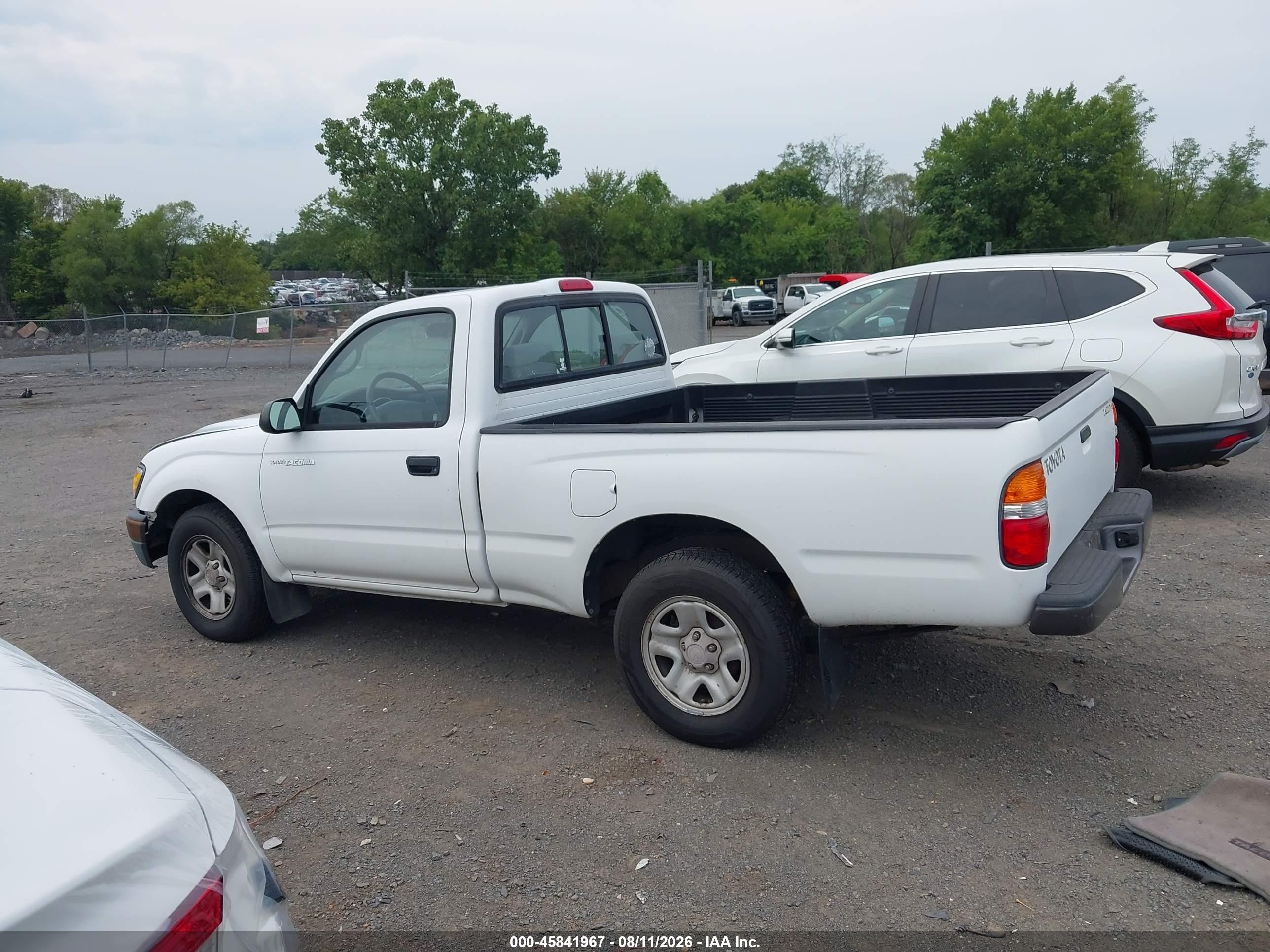 2003 Toyota Tacoma   White vin: 5TENL42N13Z302690