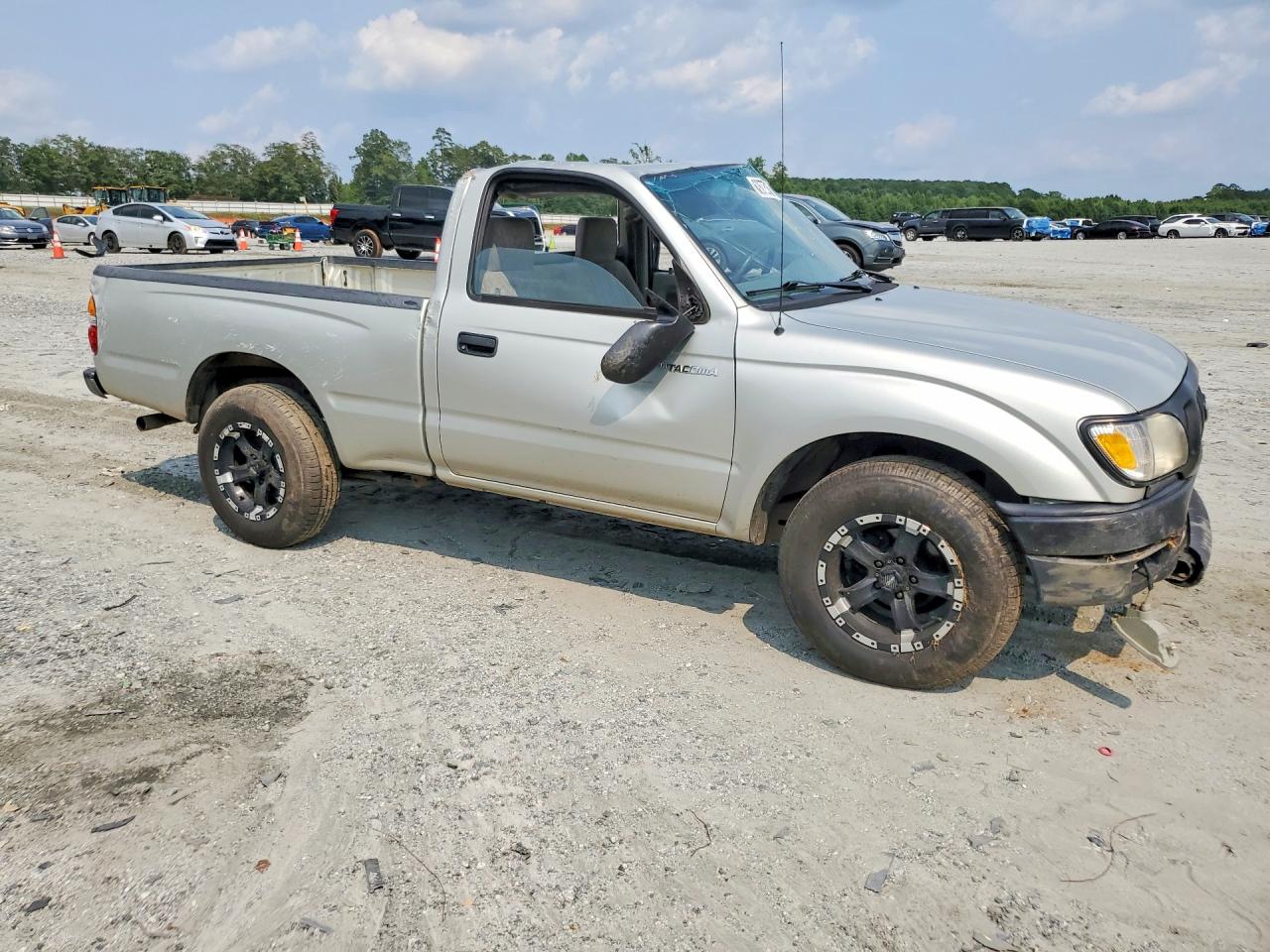2001 Toyota Tacoma Base Бежевый vin: 5TENL42N61Z743387