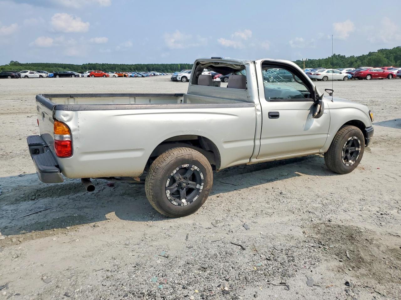 2001 Toyota Tacoma Base Бежевый vin: 5TENL42N61Z743387