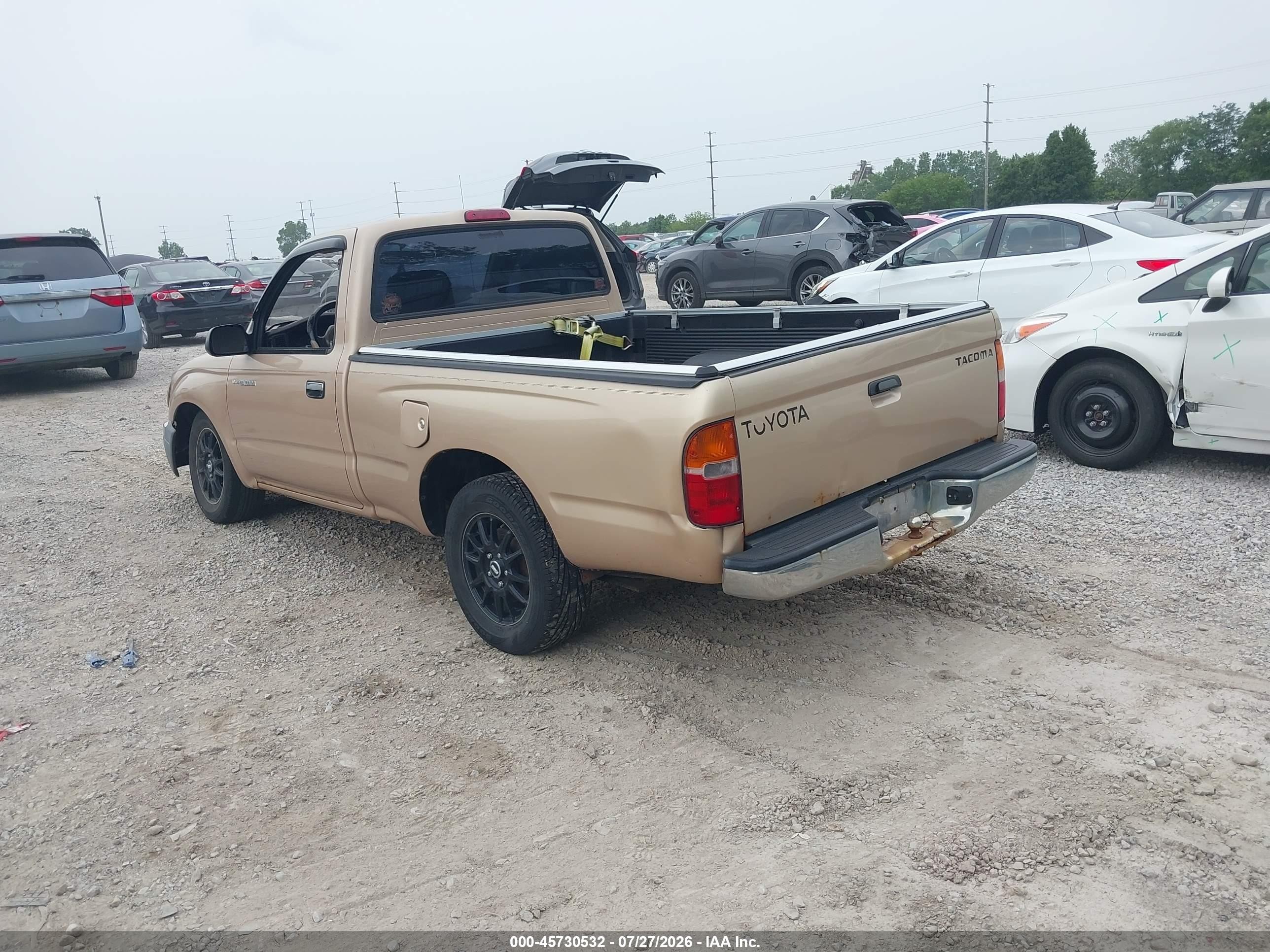 2000 Toyota Tacoma Tan vin: 5TENL42N8YZ692629