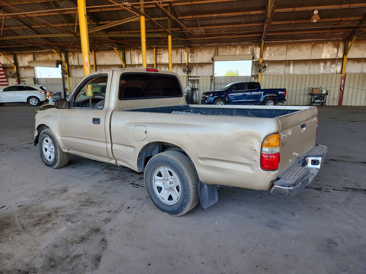 2002 Toyota Tacoma Base Gold vin: 5TENL42NX2Z040599