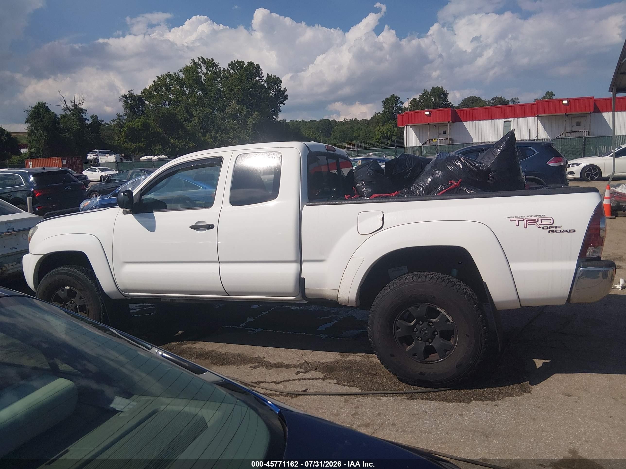 2009 Toyota Tacoma Base V6 Белый vin: 5TEUU42N09Z649672
