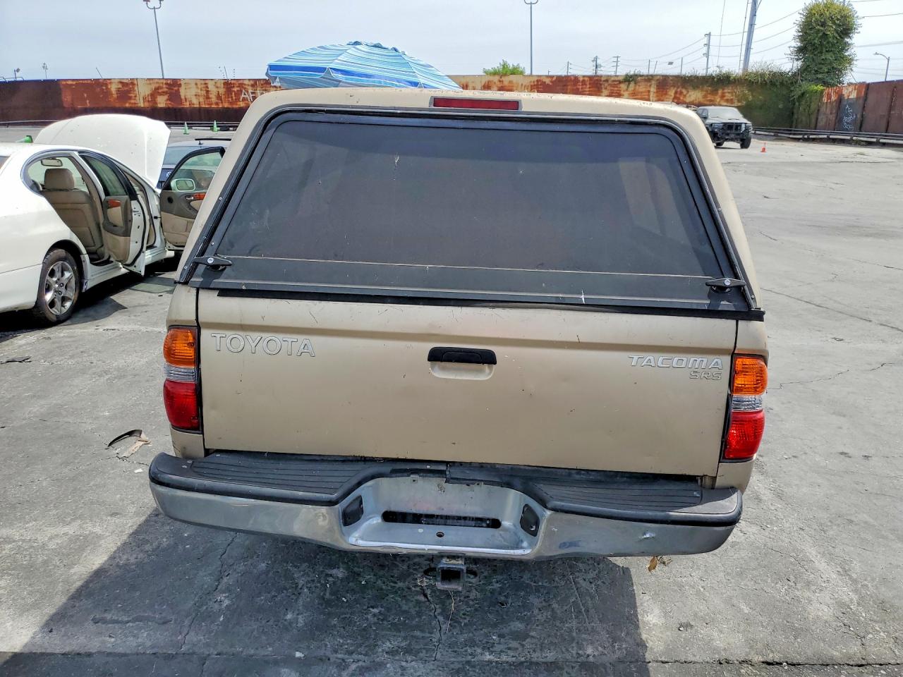 2003 Toyota Tacoma Base Золотой vin: 5TEVL52N43Z220216