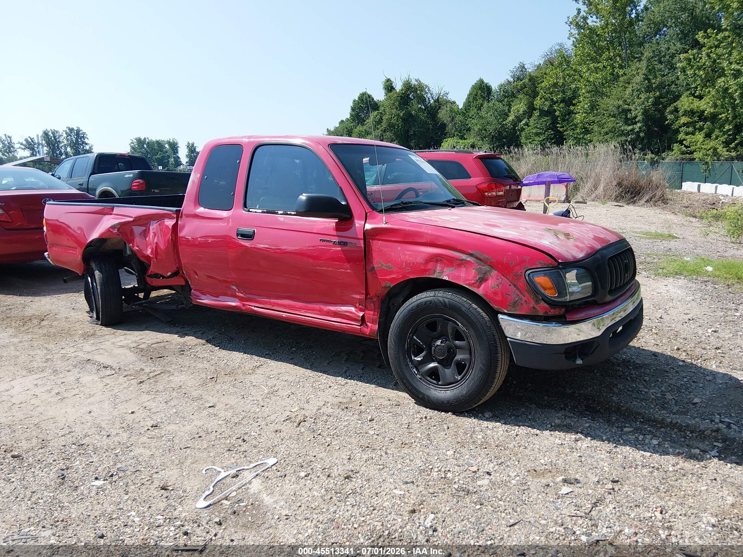 2001 Toyota Tacoma   Red vin: 5TEVL52N71Z864760