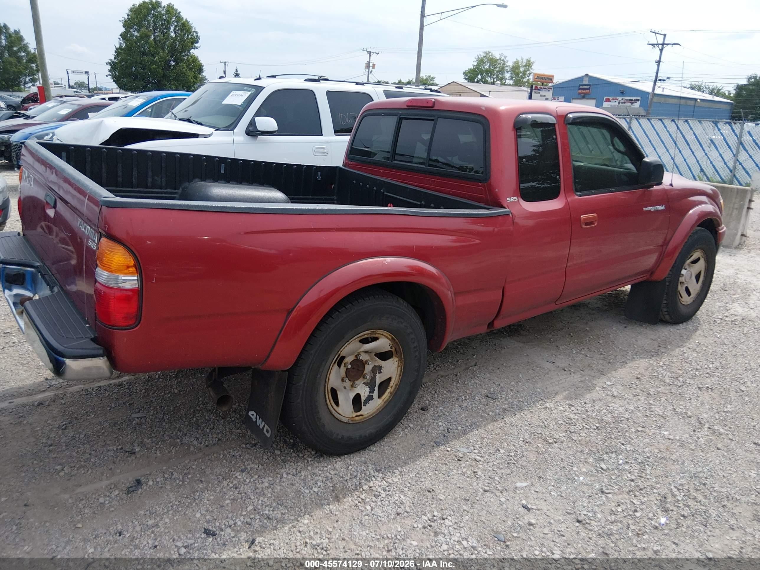 2002 Toyota Tacoma   Red vin: 5TEWM72N42Z084147