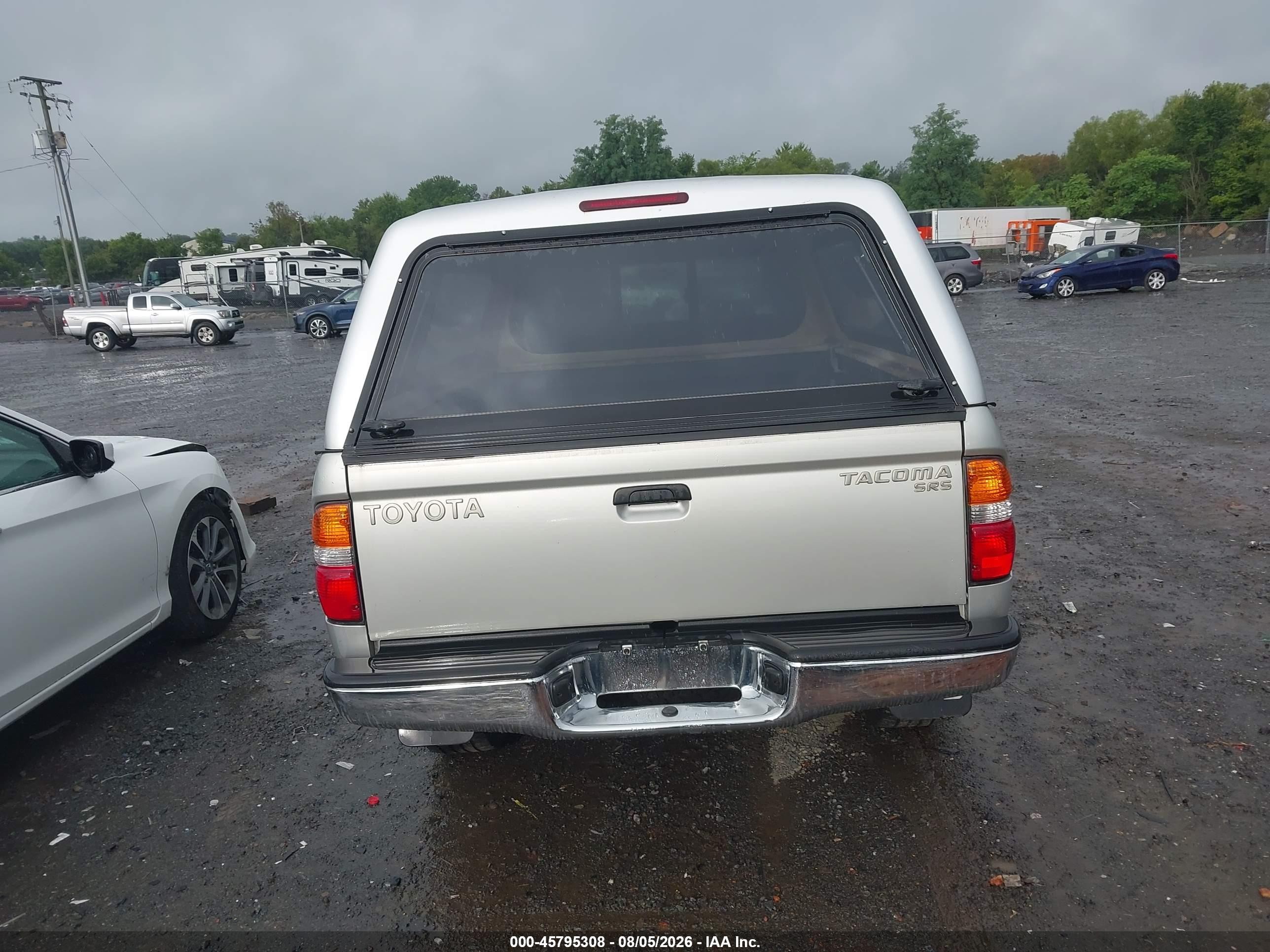 2004 Toyota Tacoma   Gold vin: 5TEWM72N84Z439131