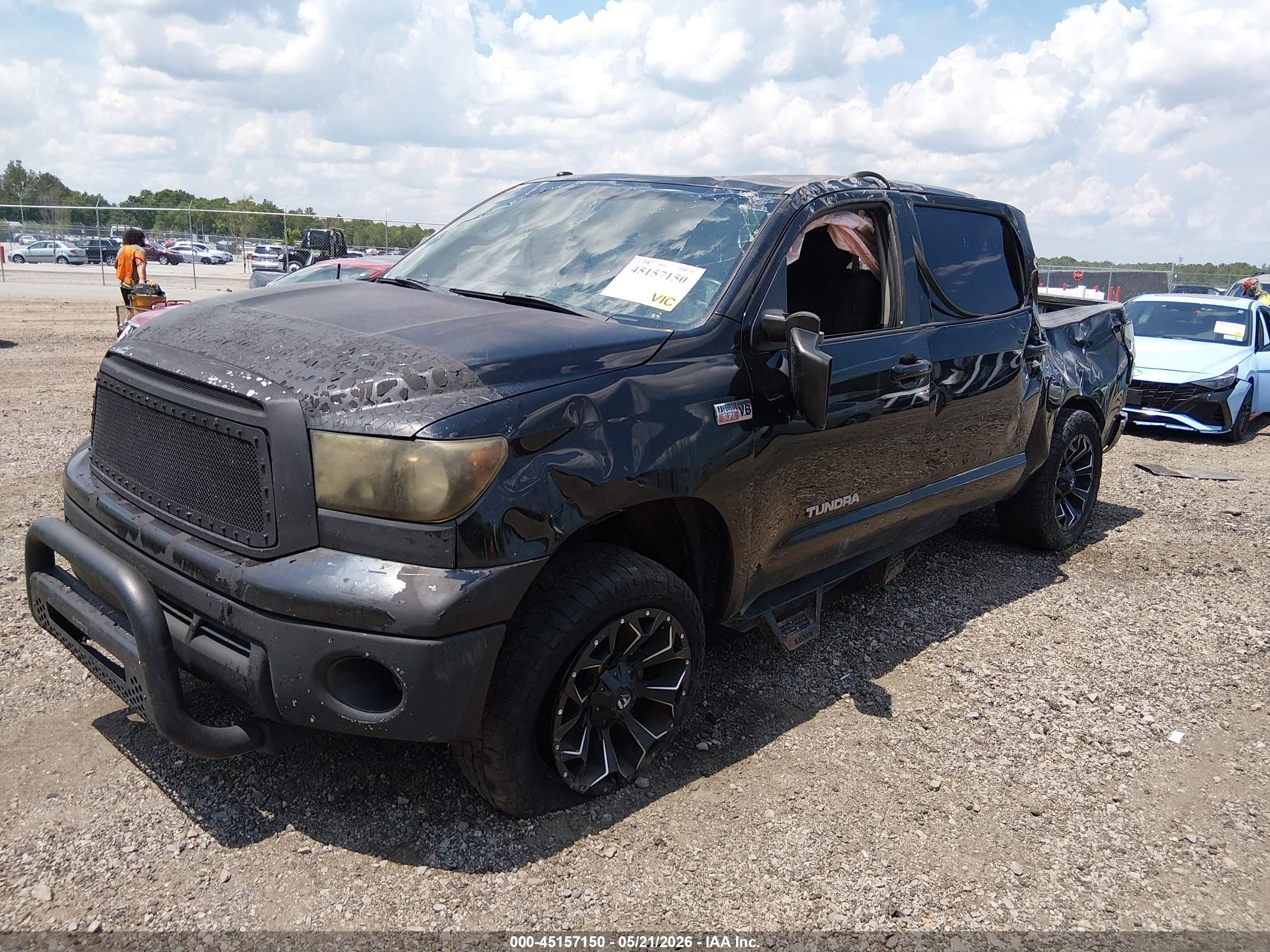 2012 Toyota Tundra Grade 5.7l V8 Black vin: 5TFDW5F10CX211787