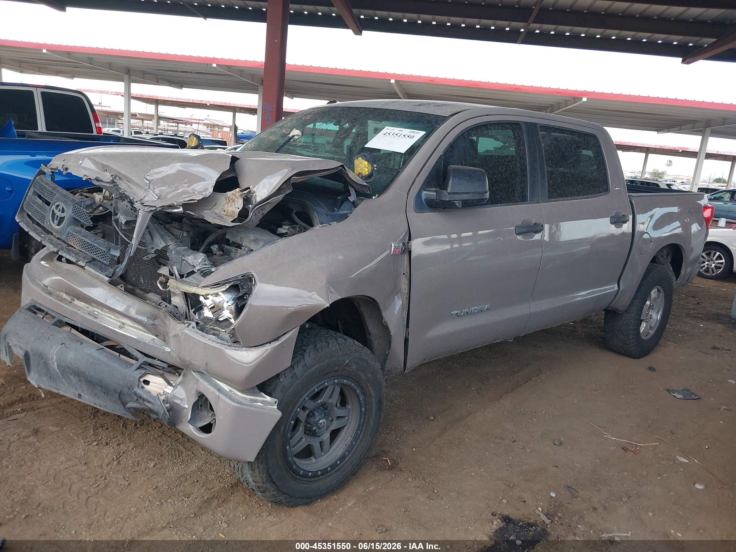 2012 Toyota Tundra Grade 5.7l V8 Серый vin: 5TFDY5F1XCX242426