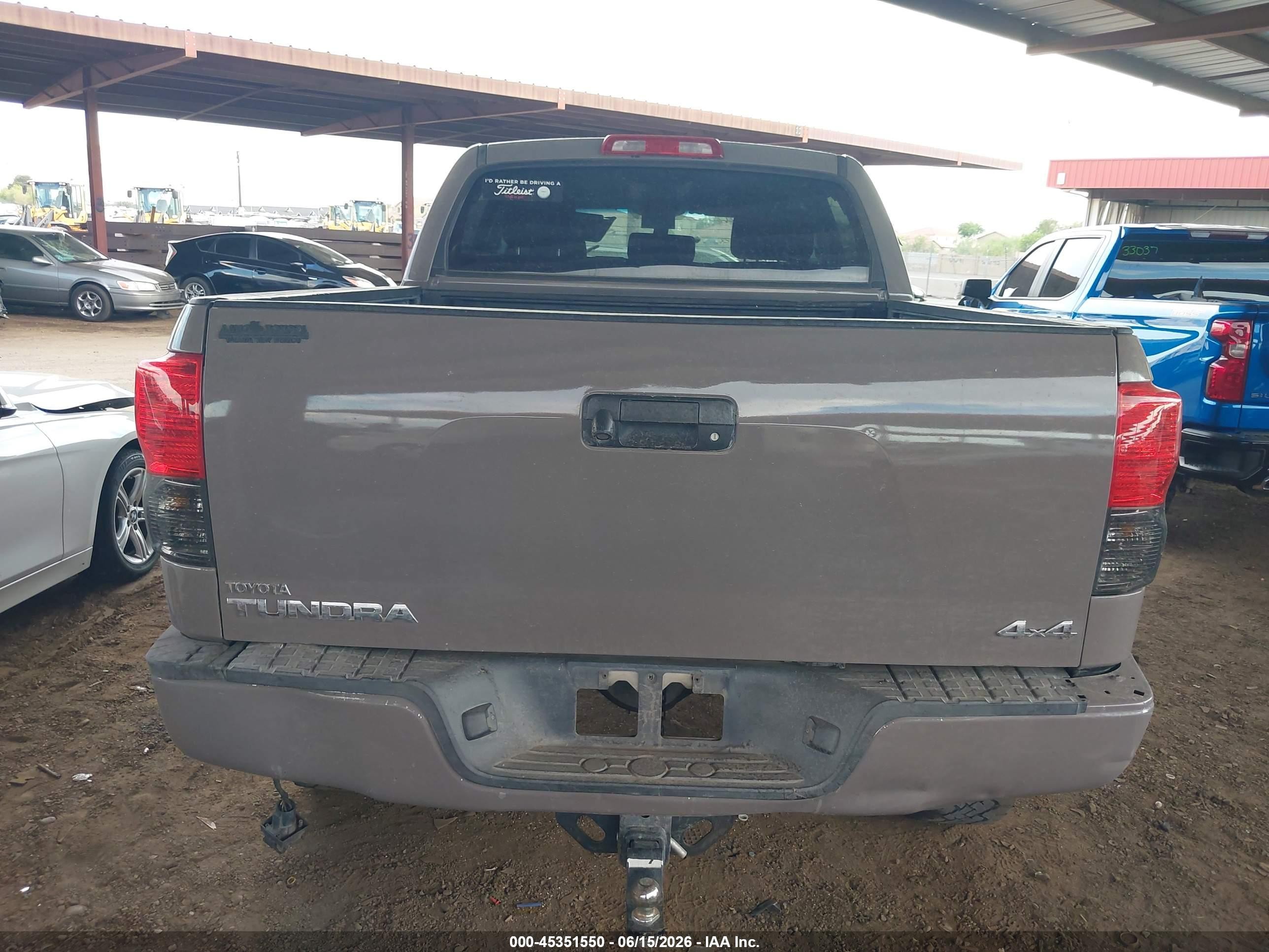 2012 Toyota Tundra Grade 5.7l V8 Серый vin: 5TFDY5F1XCX242426