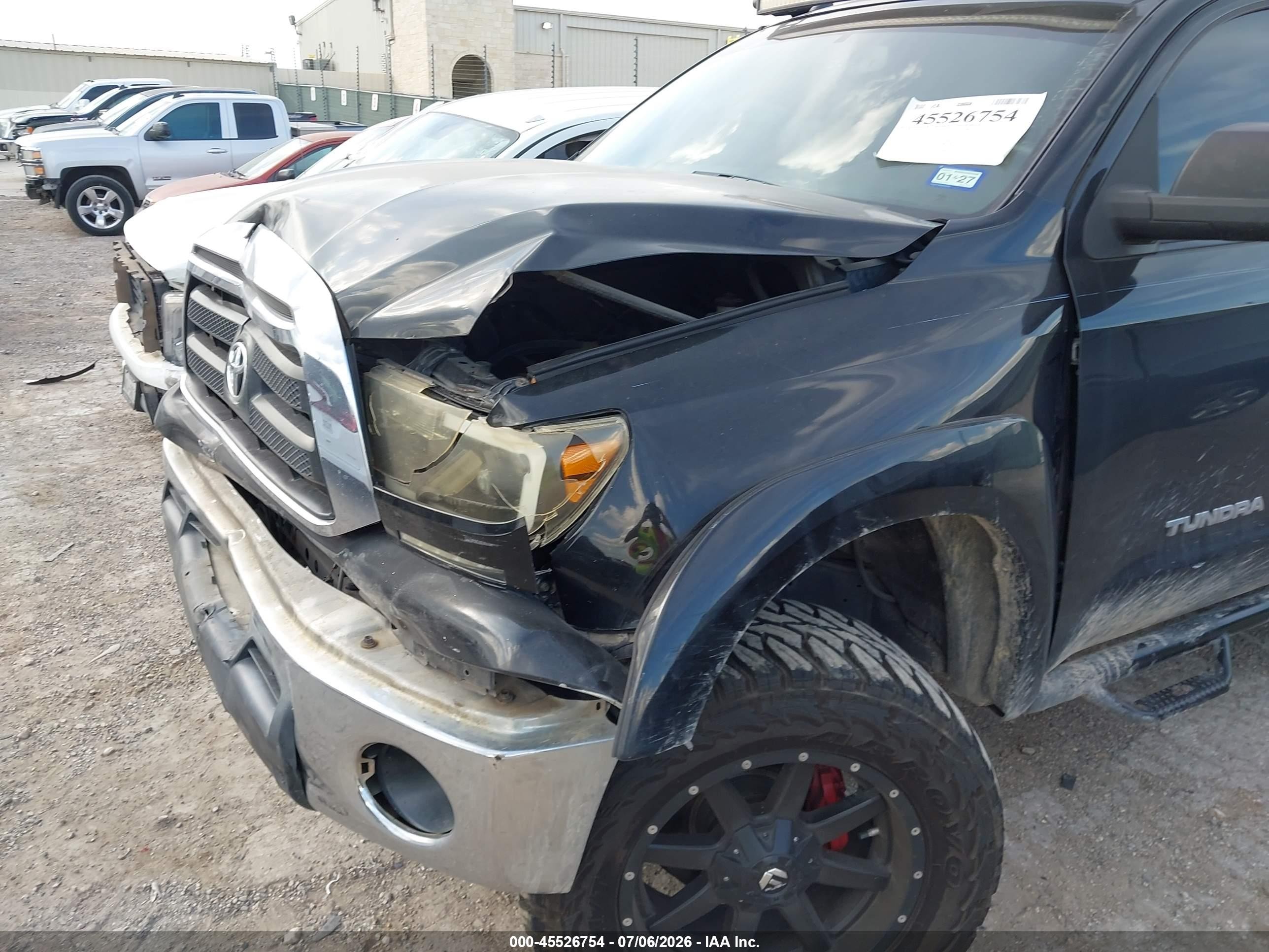 2012 Toyota Tundra Grade 4.6l V8 Черный vin: 5TFEM5F11CX051073