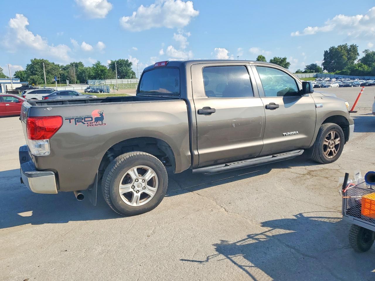 2011 Toyota Tundra Crewmax Sr5 Tan vin: 5TFEY5F12BX110375