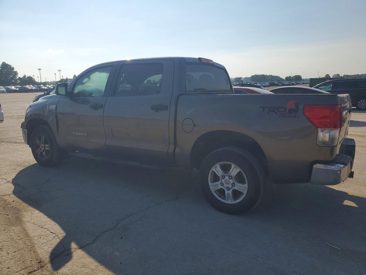2011 Toyota Tundra Crewmax Sr5 Tan vin: 5TFEY5F12BX110375