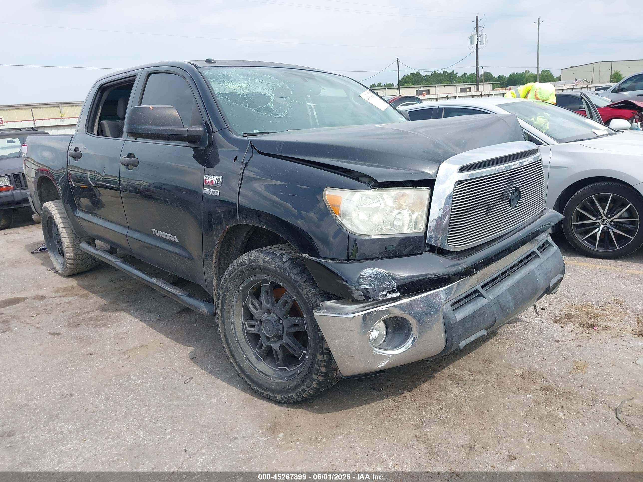 2012 Toyota Tundra Grade 5.7l V8 Black vin: 5TFEY5F18CX117882