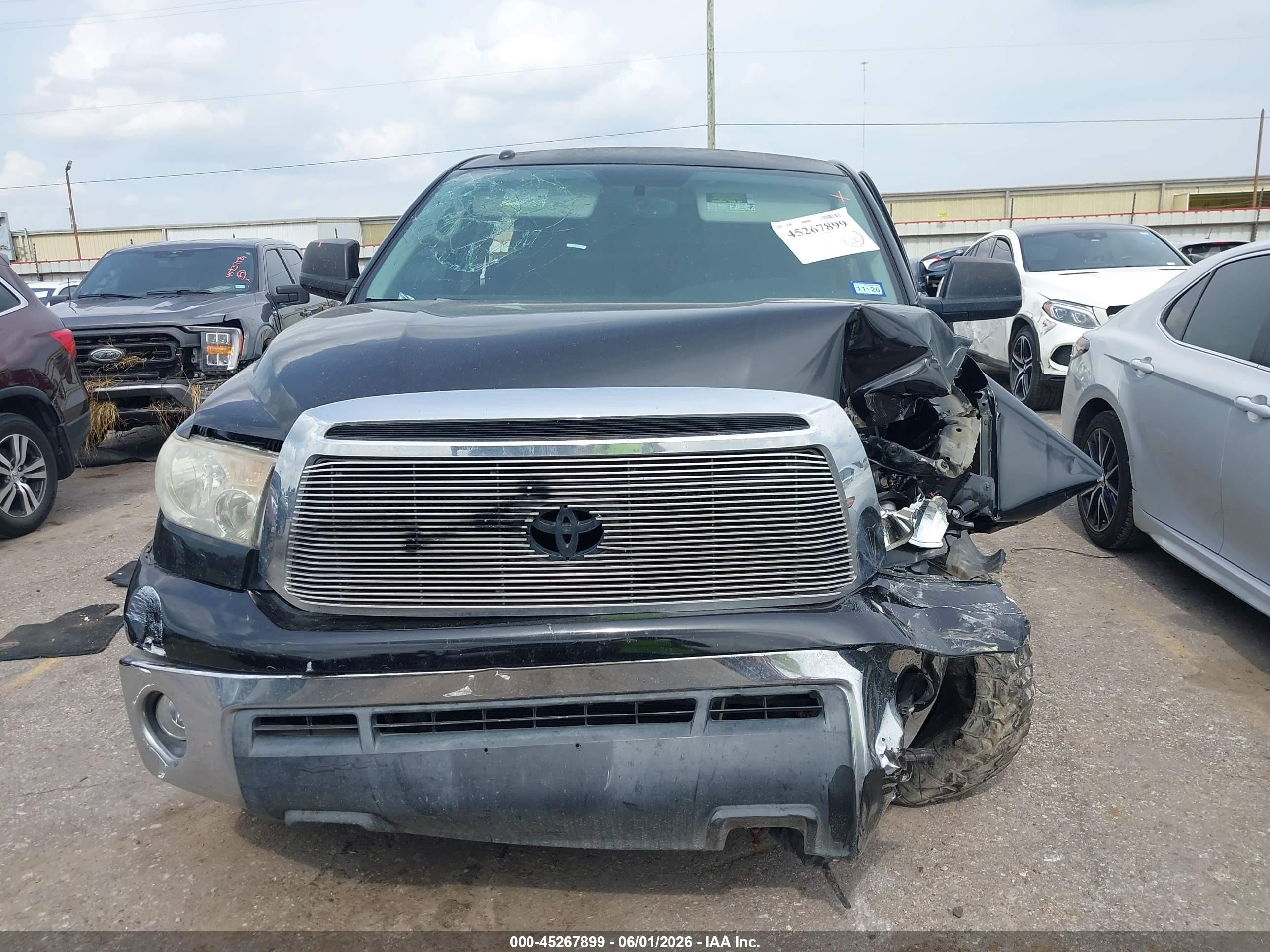 2012 Toyota Tundra Grade 5.7l V8 Black vin: 5TFEY5F18CX117882