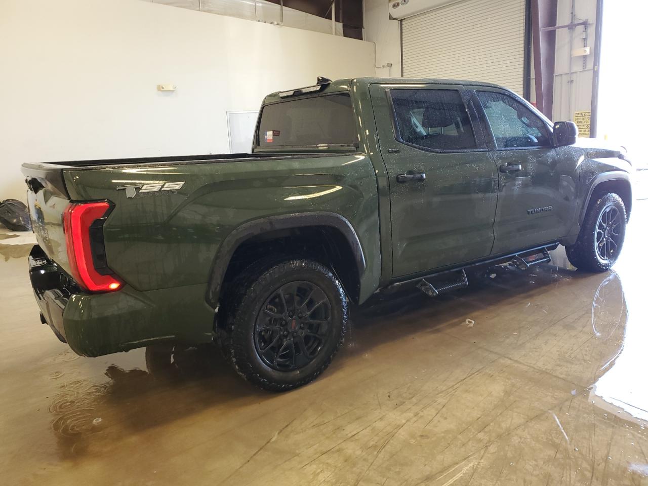 2023 Toyota Tundra Crewmax Sr Green vin: 5TFLA5DBXPX067922 Damage: Rear Bumper, Heavy Scratch, 5 to 6 inches