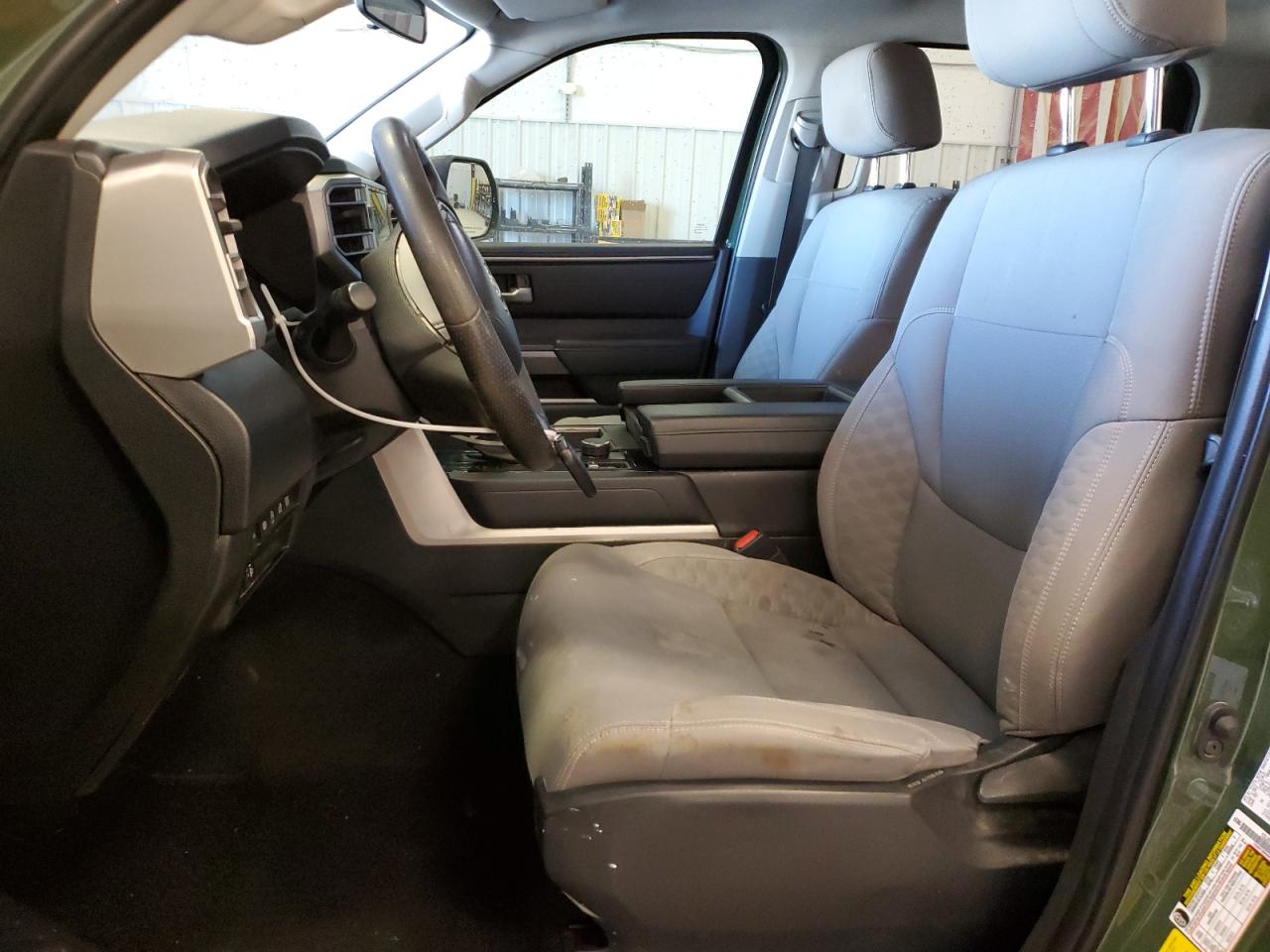 2023 Toyota Tundra Crewmax Sr Green vin: 5TFLA5DBXPX067922 Damage: Left Front Seat Cushion, Stained, Permanent