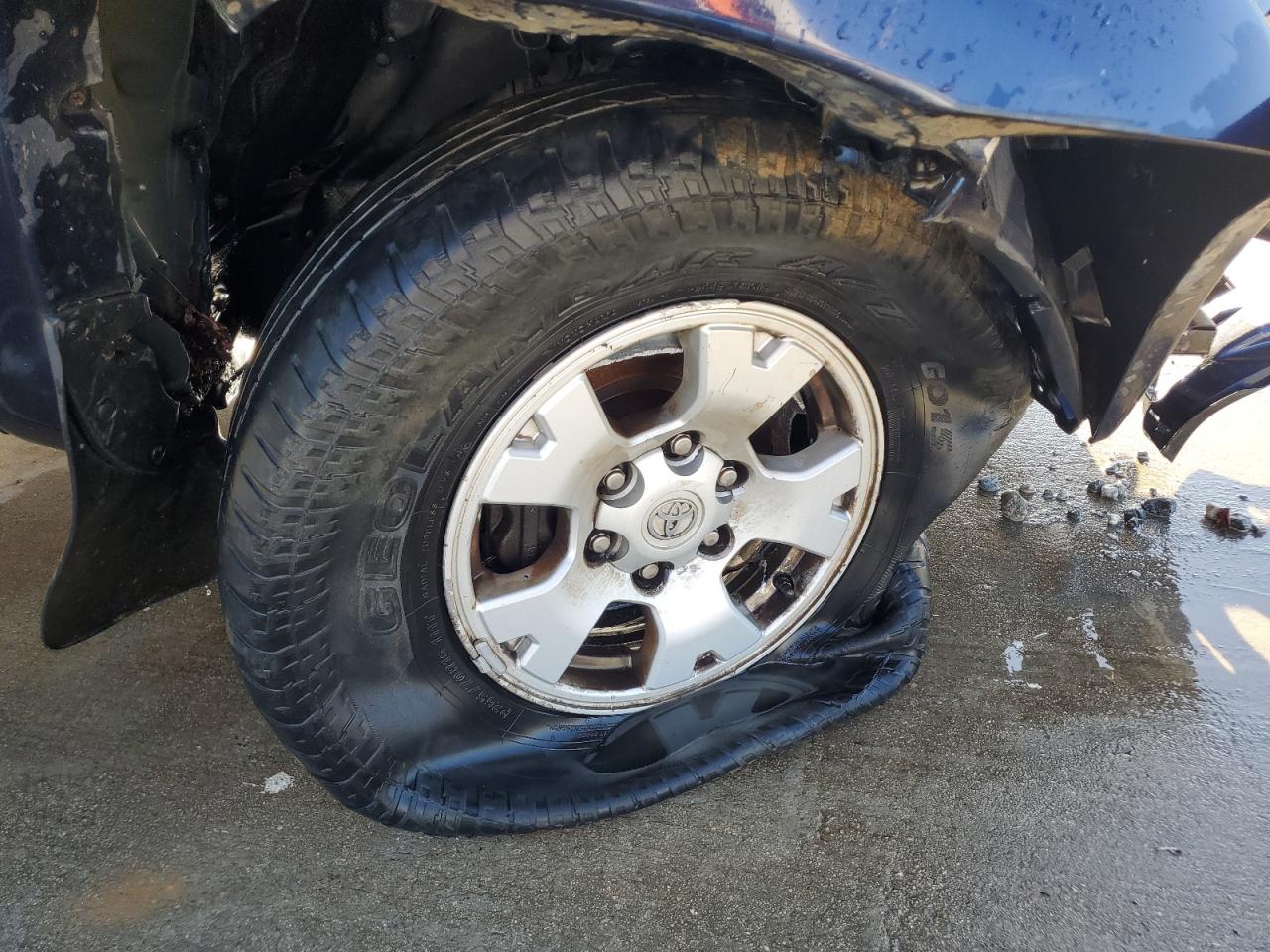 2013 Toyota Tacoma Double Cab Blue vin: 5TFLU4EN7DX079287 Damage: Right Front Tire, Flat, Repair Required