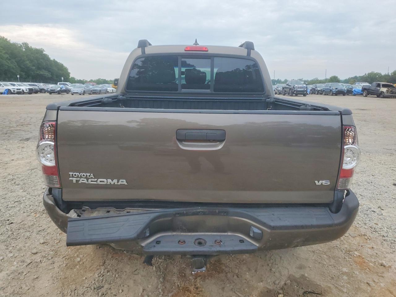 2014 Toyota Tacoma V6 Коричневый vin: 5TFLU4EN7EX090324