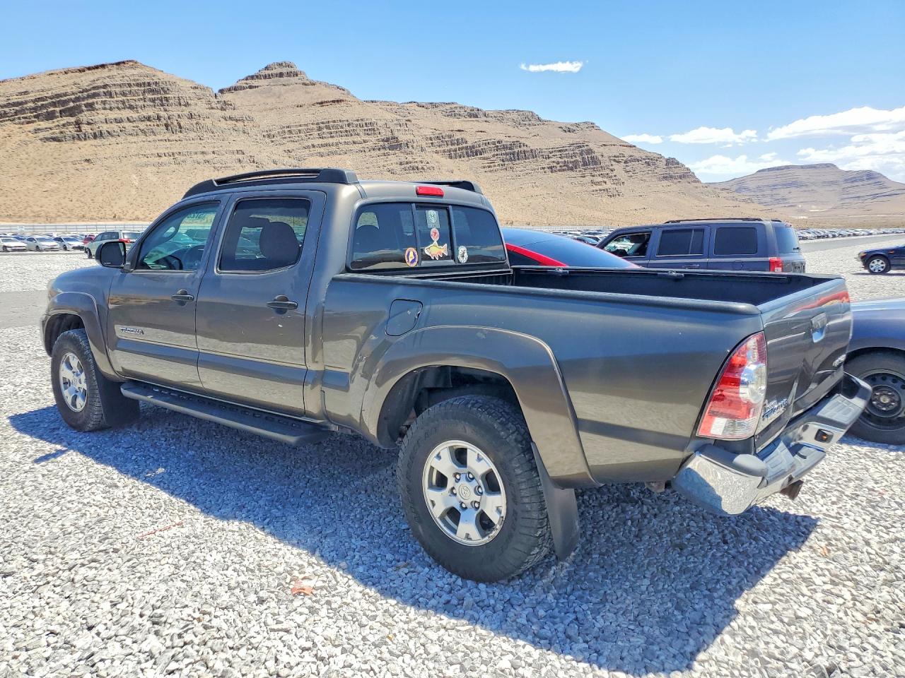 2013 Toyota Tacoma Double Cab Long Bed Tan vin: 5TFMU4FNXDX015618