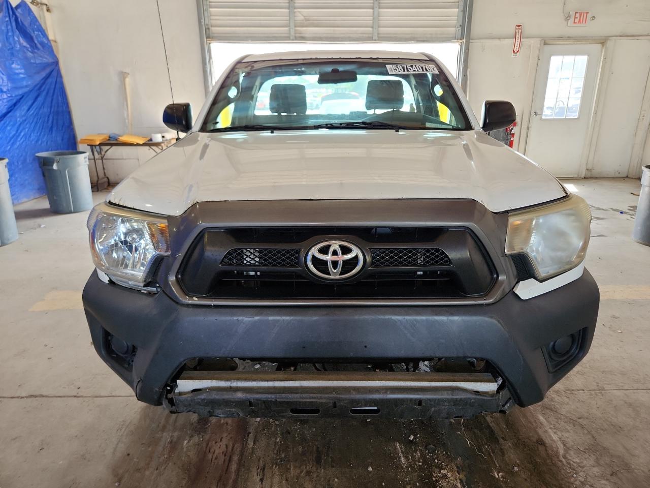 2014 Toyota Tacoma Base White vin: 5TFNX4CN3EX038157 Damage: Grille, Chipped, 3