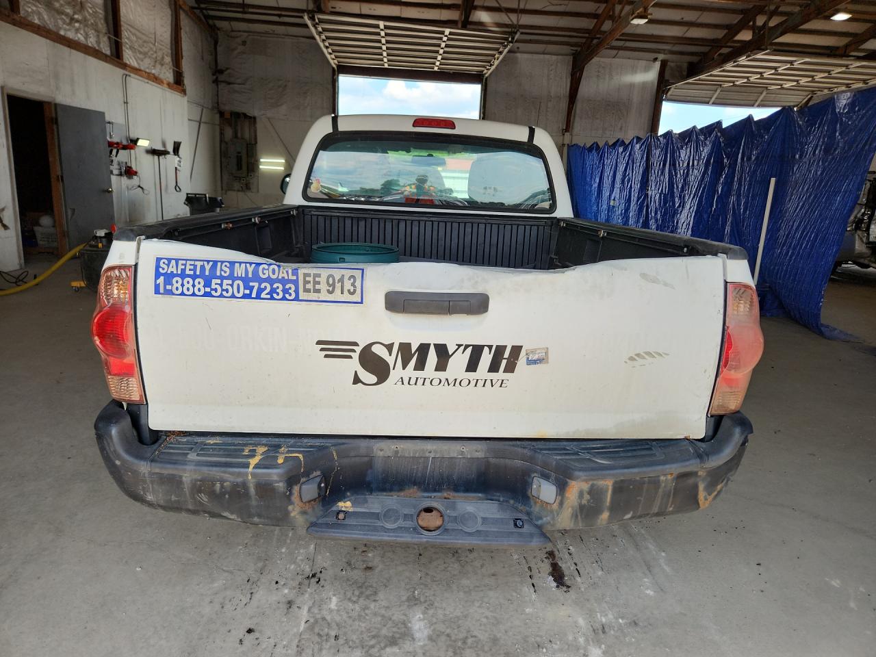 2014 Toyota Tacoma Base White vin: 5TFNX4CN3EX038157 Damage: Right Tail Light, Faded, Repair Required