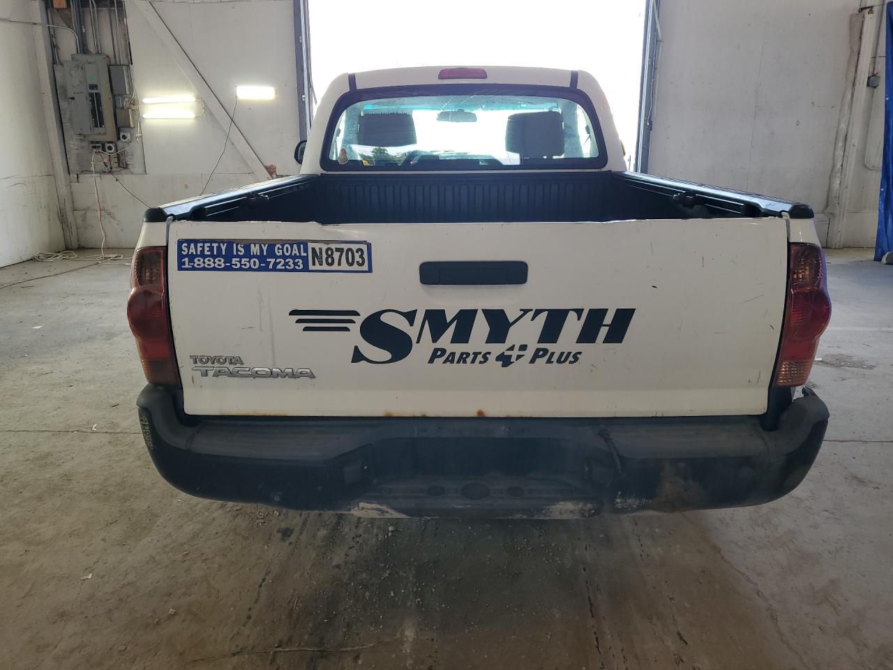 2014 Toyota Tacoma Base White vin: 5TFNX4CN4EX042525 Damage: Right Tail Light, Cracked, Replacement Required