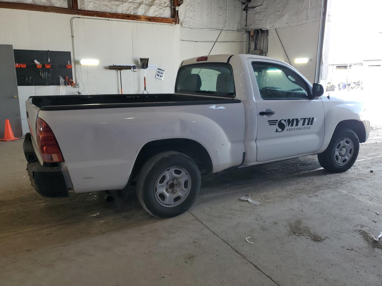 2014 Toyota Tacoma Base White vin: 5TFNX4CN4EX042525 Damage: Right Rear Center Cap, Missing, Replacement Required