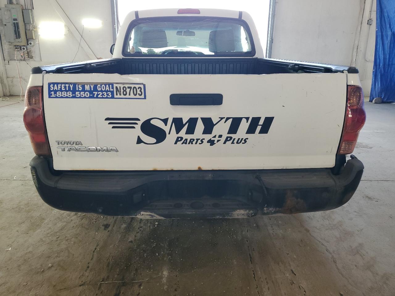 2014 Toyota Tacoma Base White vin: 5TFNX4CN4EX042525 Damage: Tailgate, Rust, 5 To 6 Inches