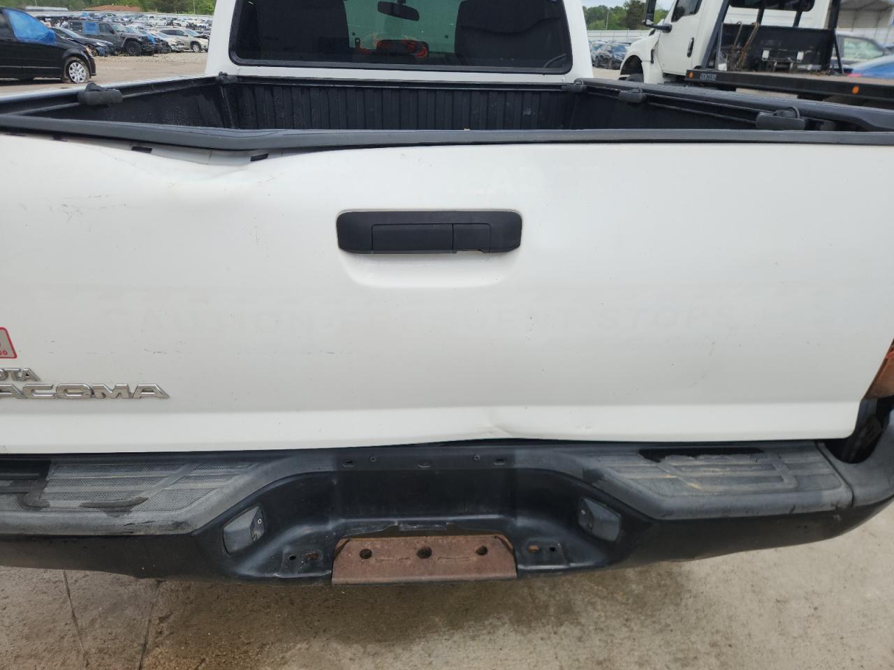 2014 Toyota Tacoma Base White vin: 5TFNX4CN6EX035608 Damage: Tailgate, Severe Damage, Replacement Required