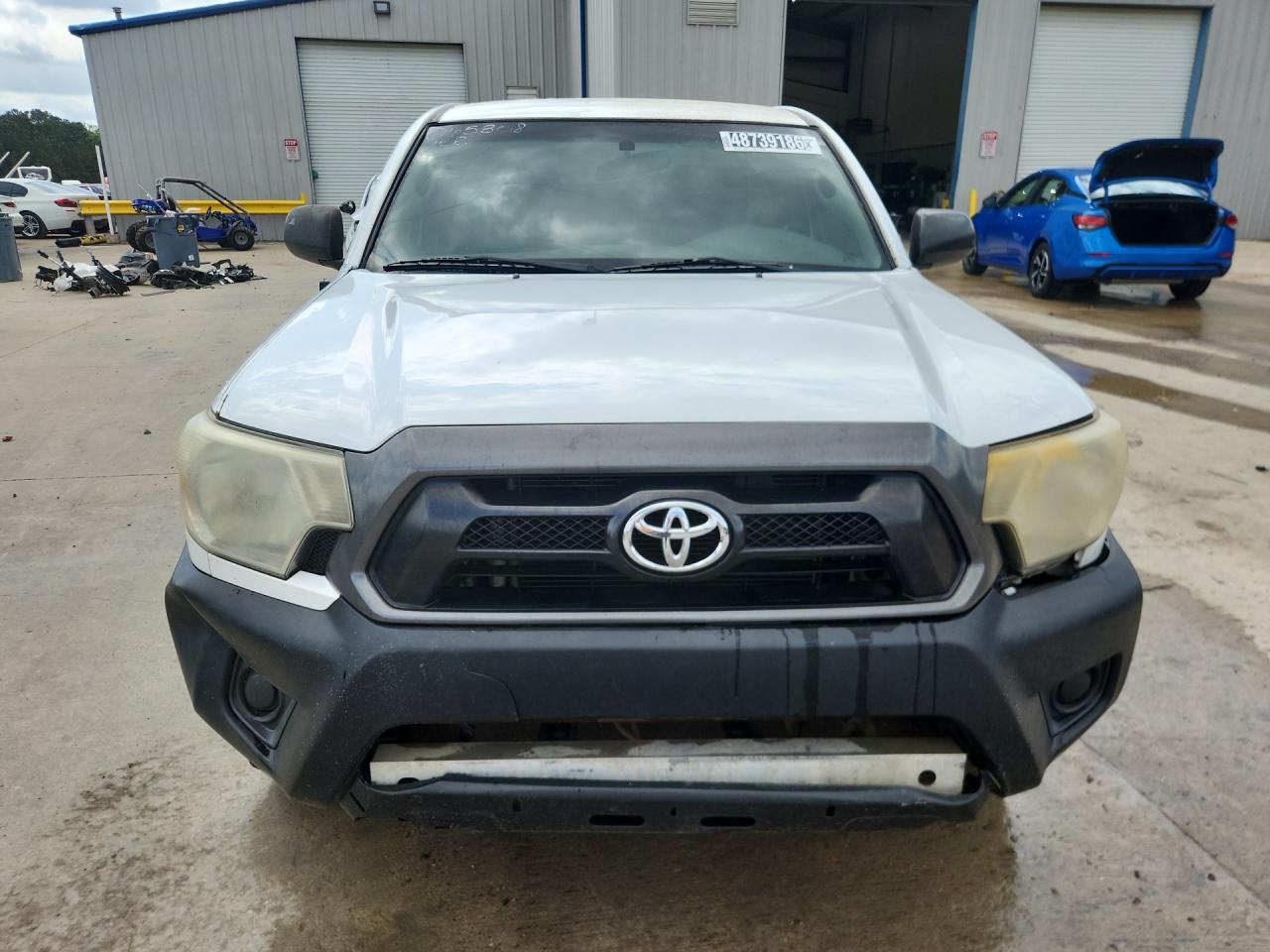 2014 Toyota Tacoma Base White vin: 5TFNX4CN6EX035608 Damage: Hood, Dent(S) W/ Paint Dmg, 2 To 3 Inches