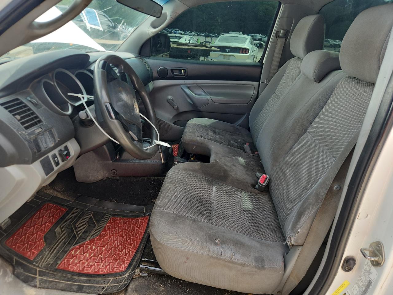 2014 Toyota Tacoma Base White vin: 5TFNX4CN6EX035608 Damage: Left Front Seat Cushion, Stained, Permanent