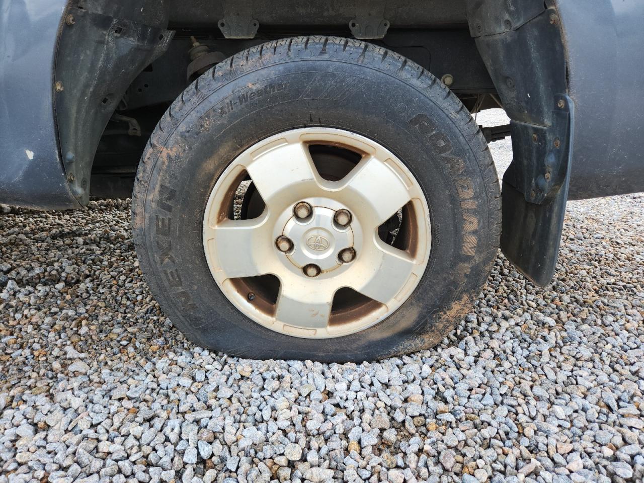 2008 Toyota Tundra Grade Blue vin: 5TFRV54148X063792 Damage: Left Rear Wheel, Curb Rash, 3 To 4 Inches