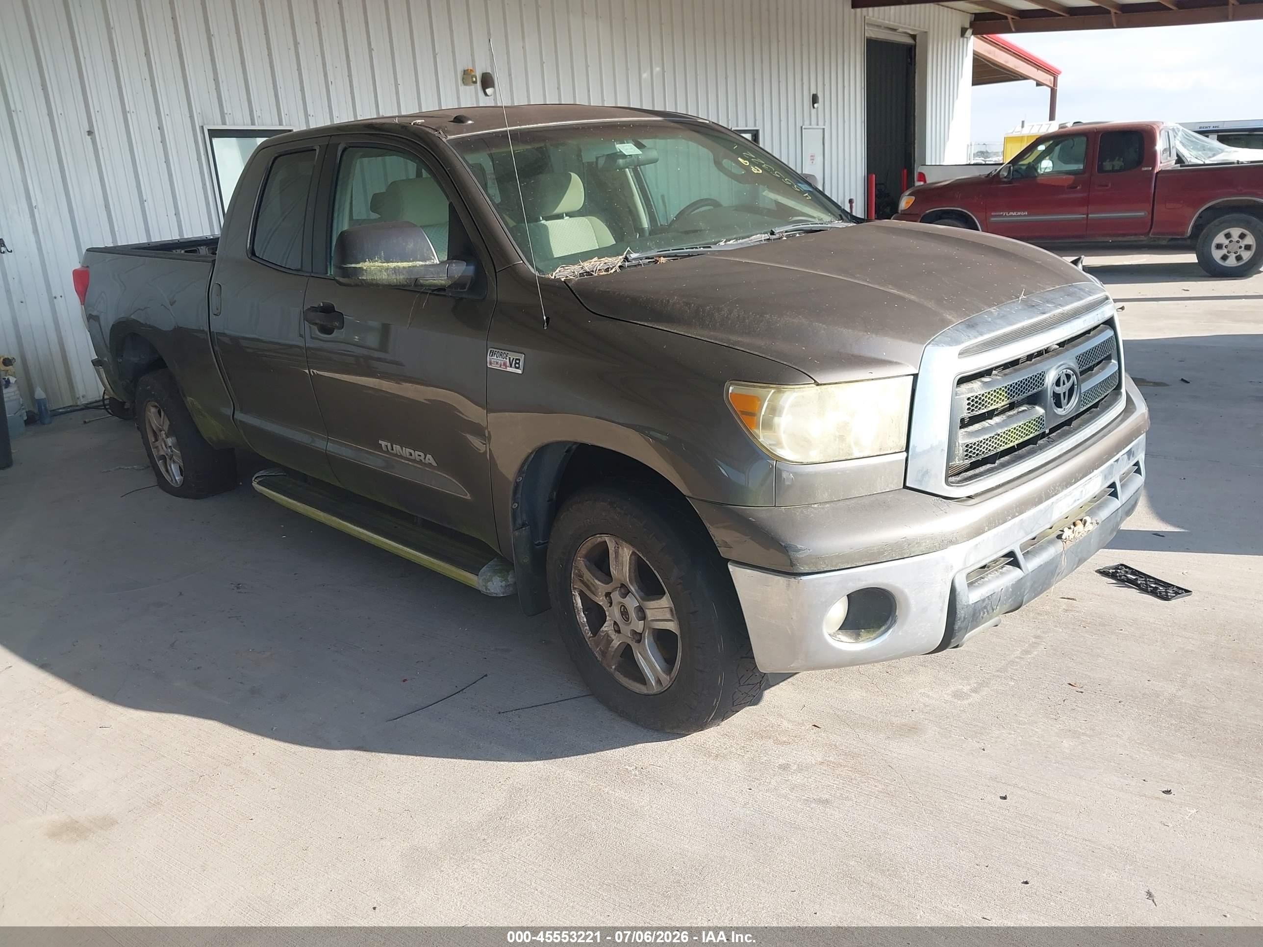 2010 Toyota Tundra Grade 5.7l V8 Tan vin: 5TFRY5F12AX075420