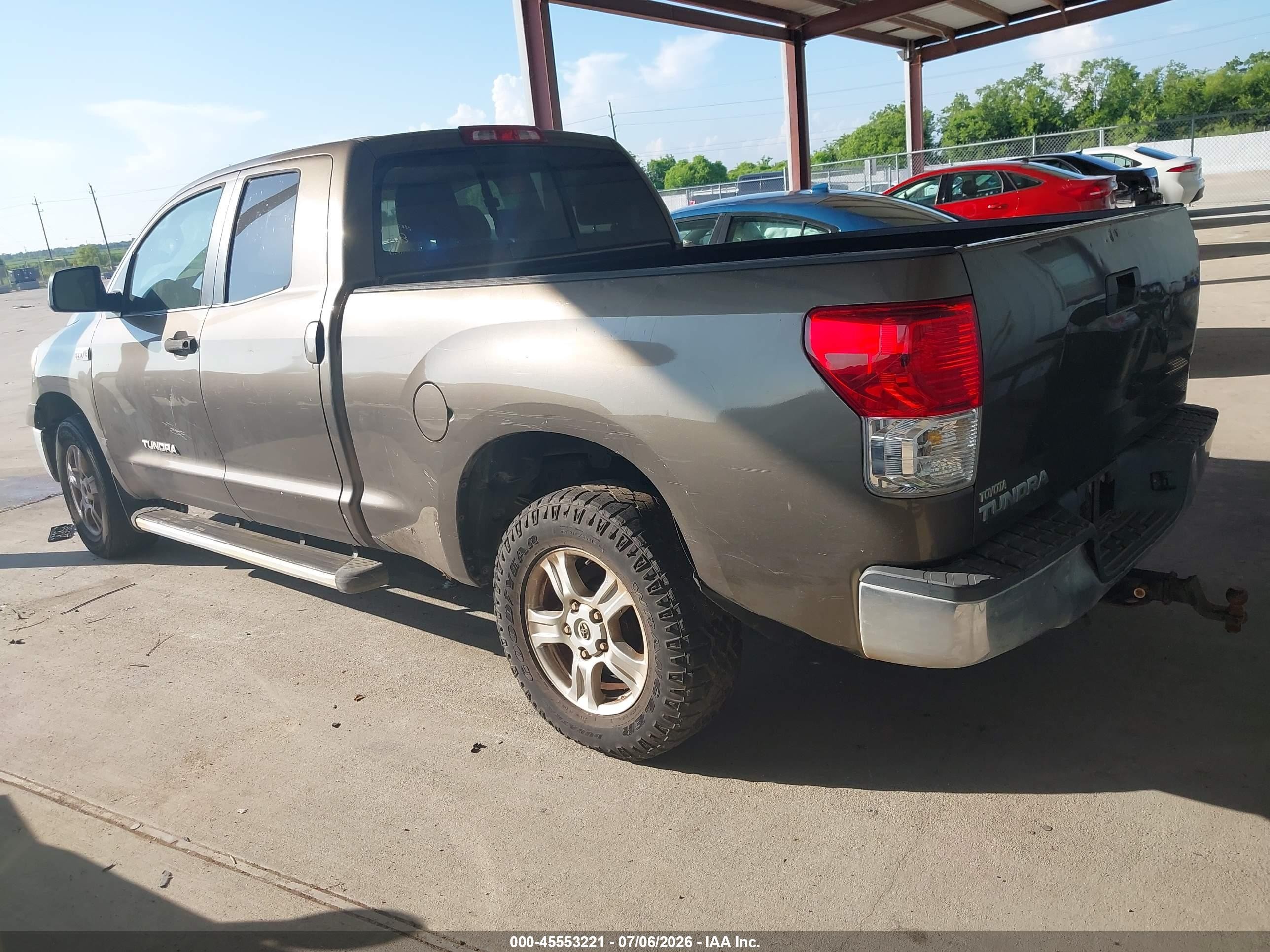 2010 Toyota Tundra Grade 5.7l V8 Tan vin: 5TFRY5F12AX075420